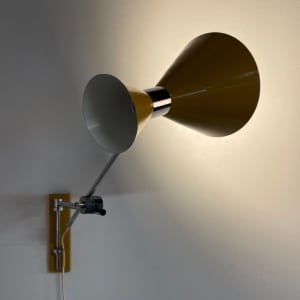 Yellow Diabolo Wall Light by Herda