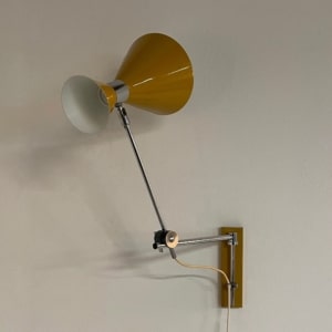 Yellow Diabolo Wall Light by Herda