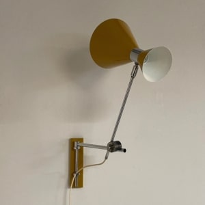 Yellow Diabolo Wall Light by Herda