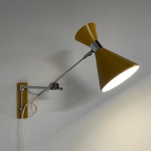 Yellow Diabolo Wall Light by Herda