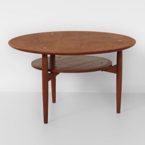 Round Danish coffee table, 1960s, teak with brass inlay and lower shelf