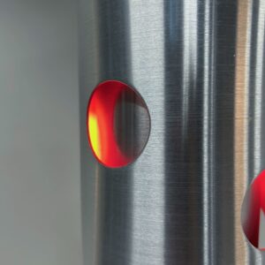 Cylinder pendant lamp by Doria Leuchten, Germany, 1970s, aluminium with red perforations