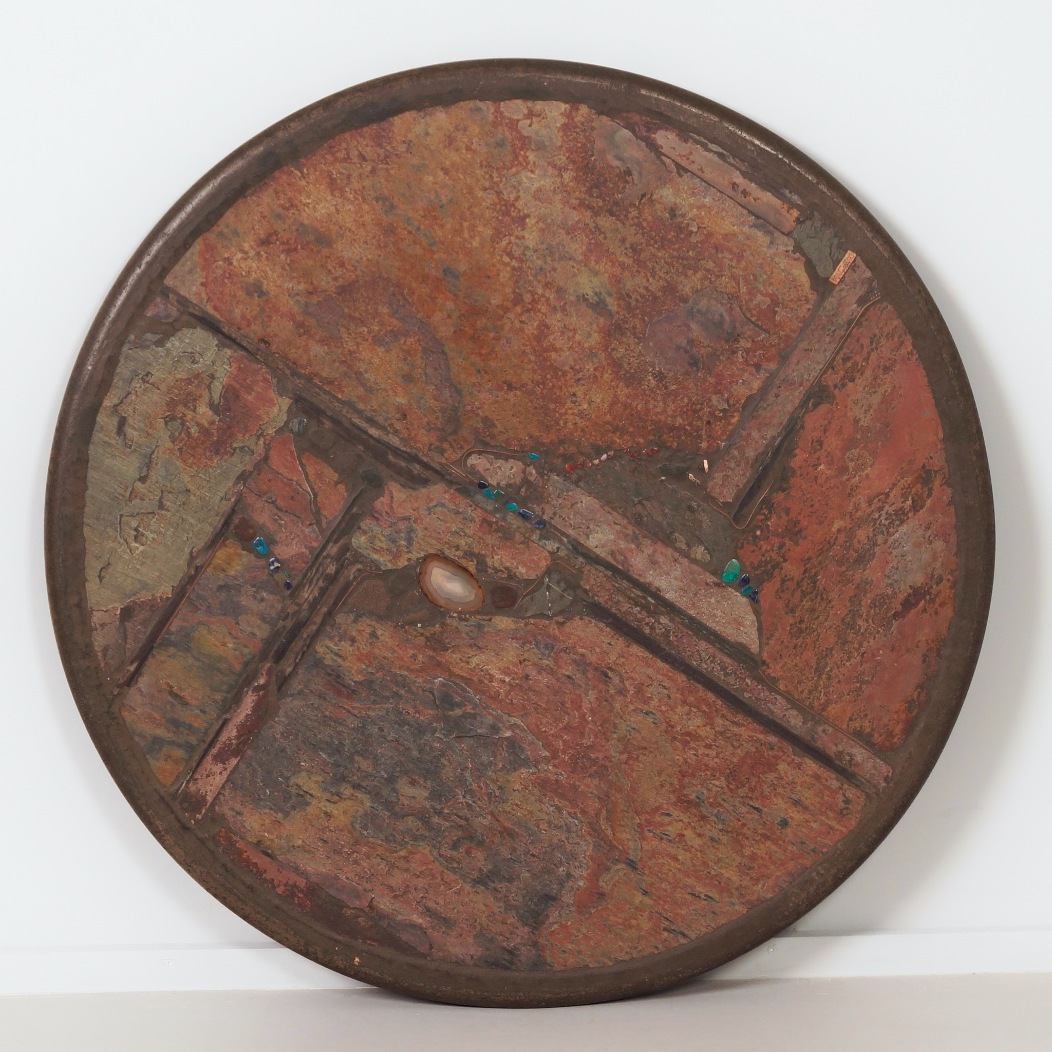 Round coffee table by Paul Kingma from 1990 in earthy tones with inlay of semi-precious stones