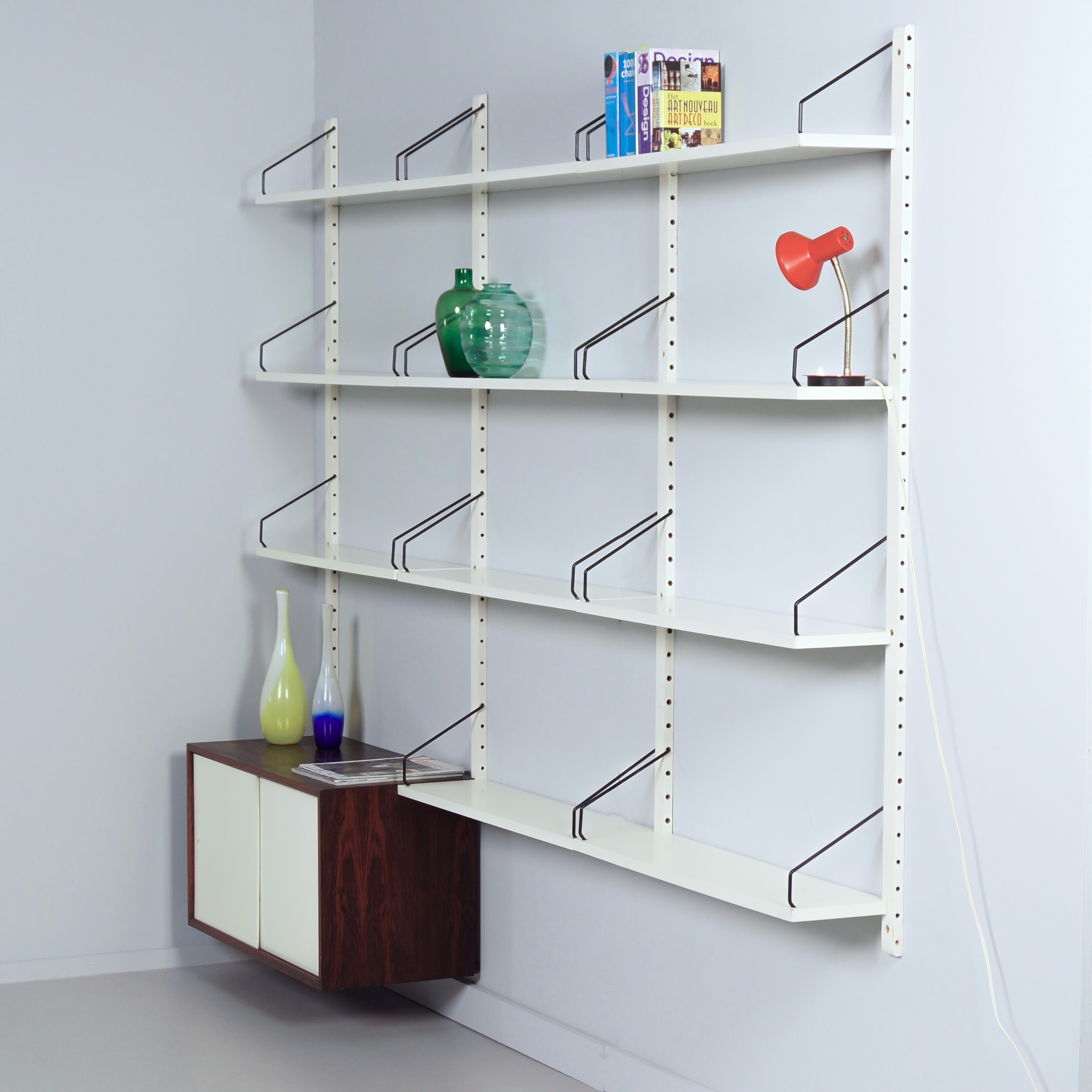 Royal System Wall system by Poul Cadovius for Cado from the 70s in white wood and rosewood