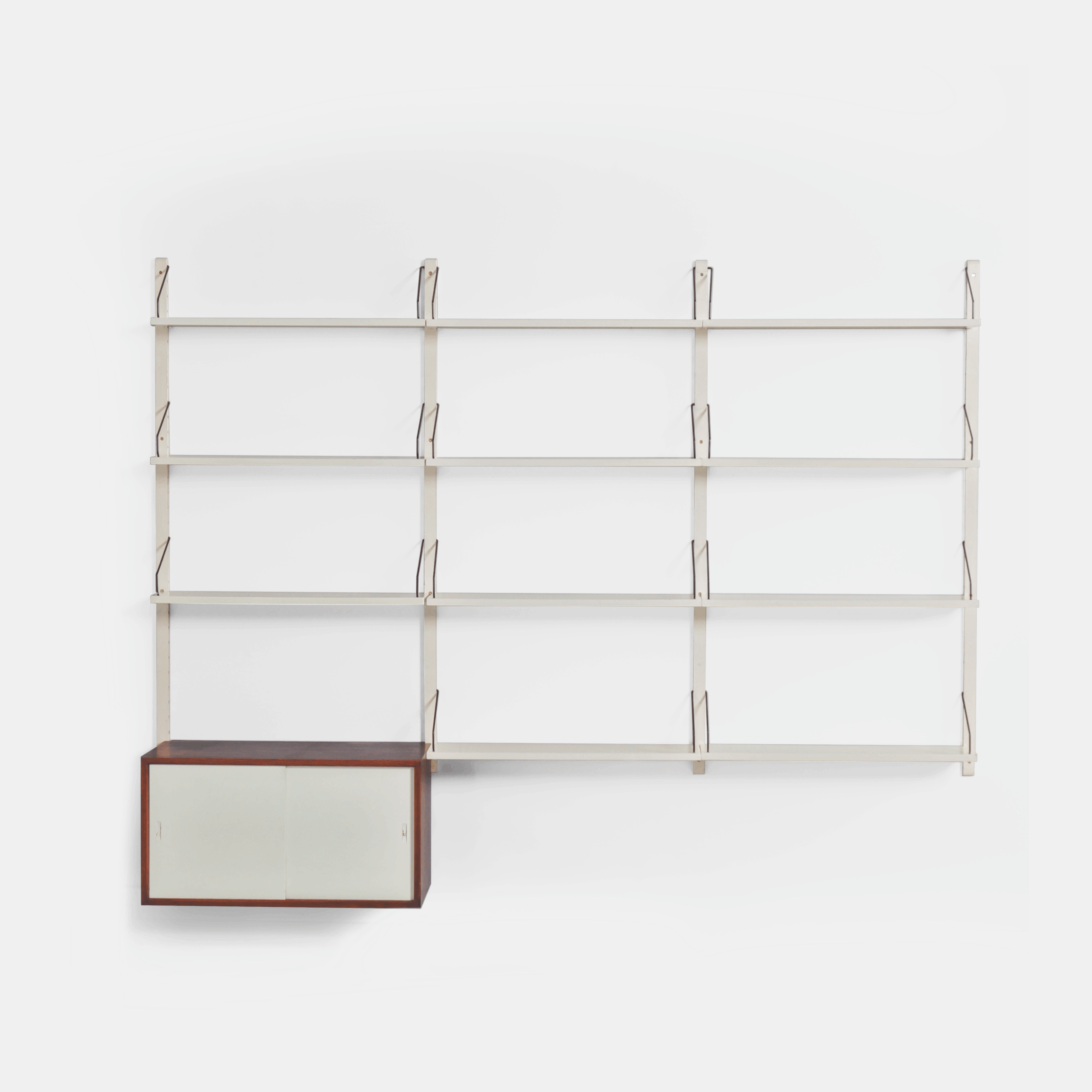 Royal System Wall system by Poul Cadovius for Cado from the 70s in white wood and rosewood